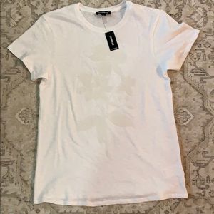 White T with beaded detail